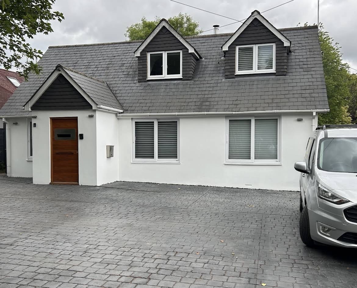 After, Chalet-style home, full exterior refresh