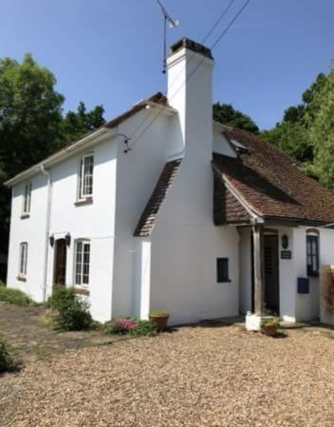 Rendered cottage, exterior repaint