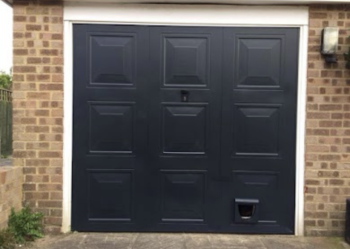 Garage door, sprayed finish